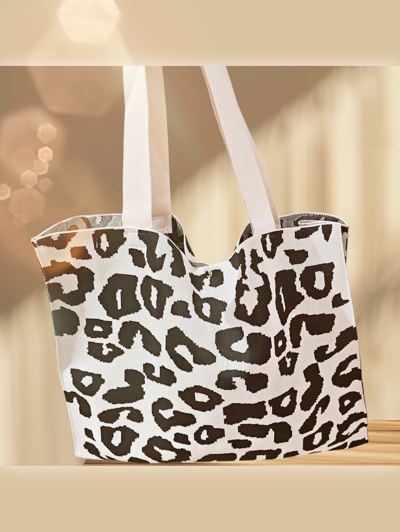 Beuteltasche-leo-beige-schwarz