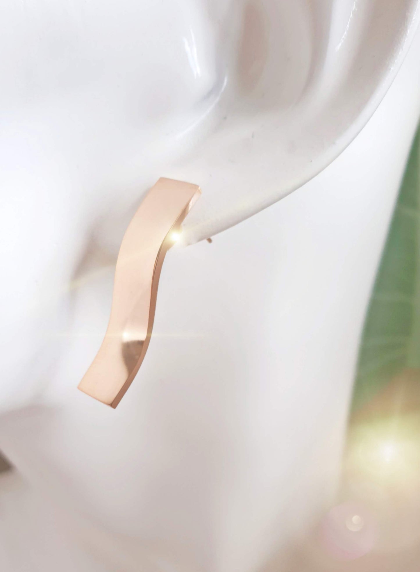 Lange Ohrstecker in Roségold