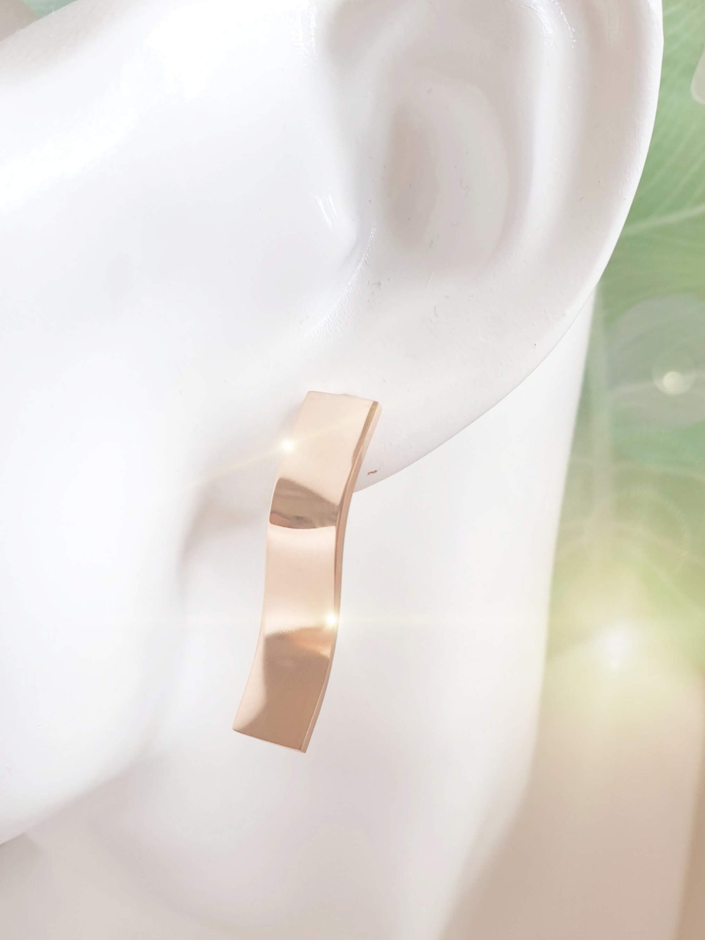 Lange Ohrstecker in Roségold