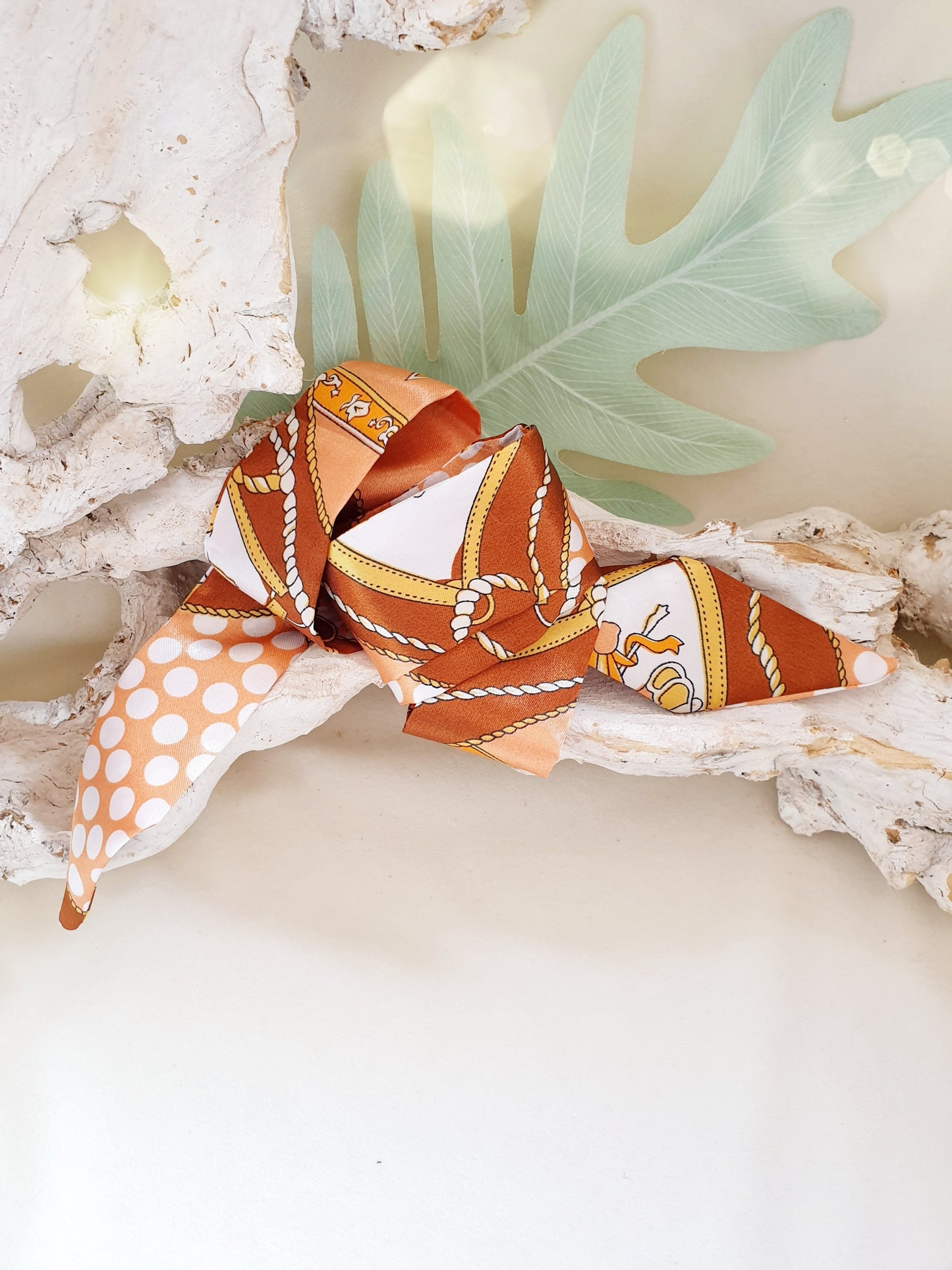 Satinband in Orange gemustert