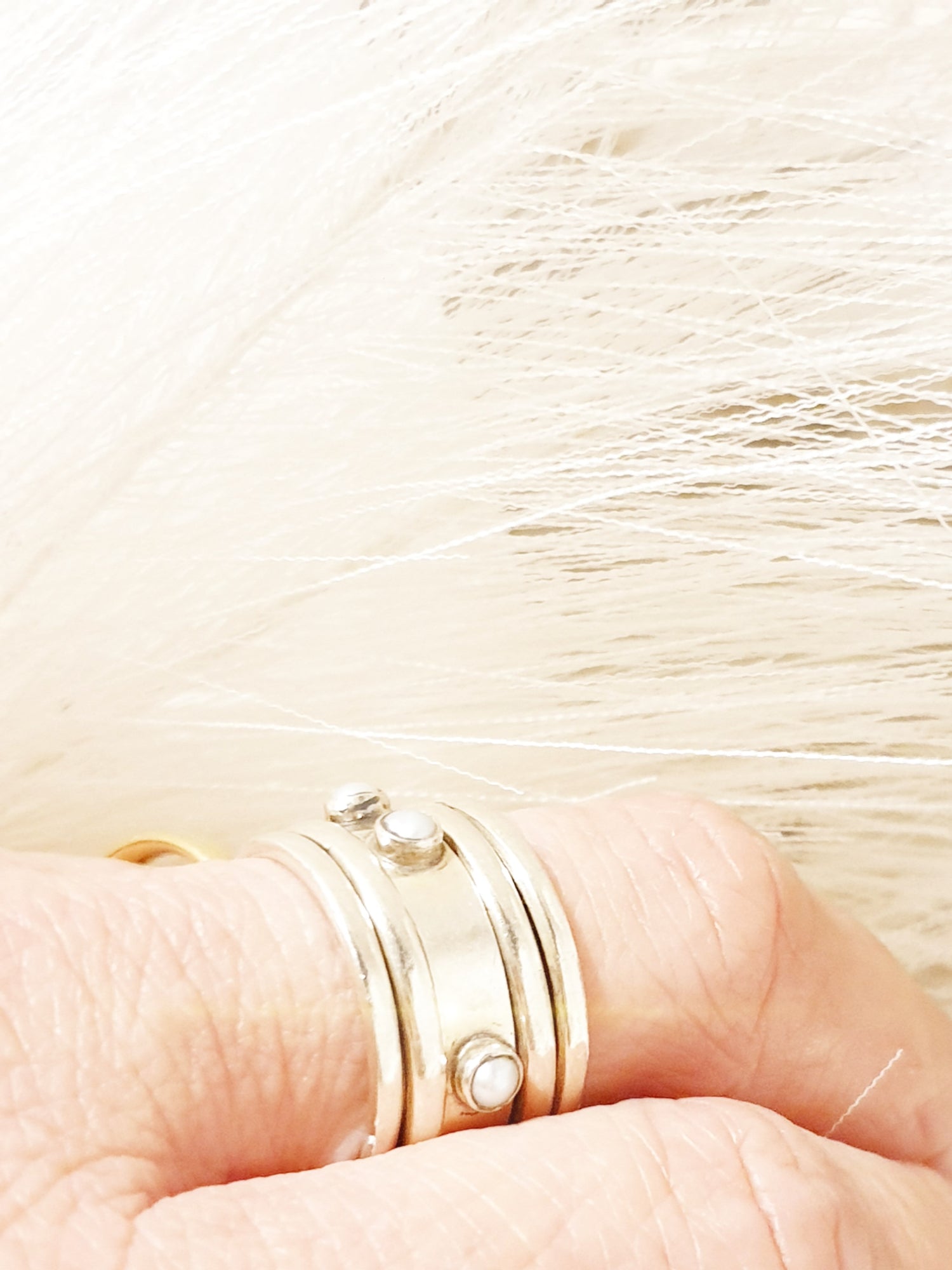 Beweglicher Sterlingsilber Ring mit kleinen Süßwasserperlen