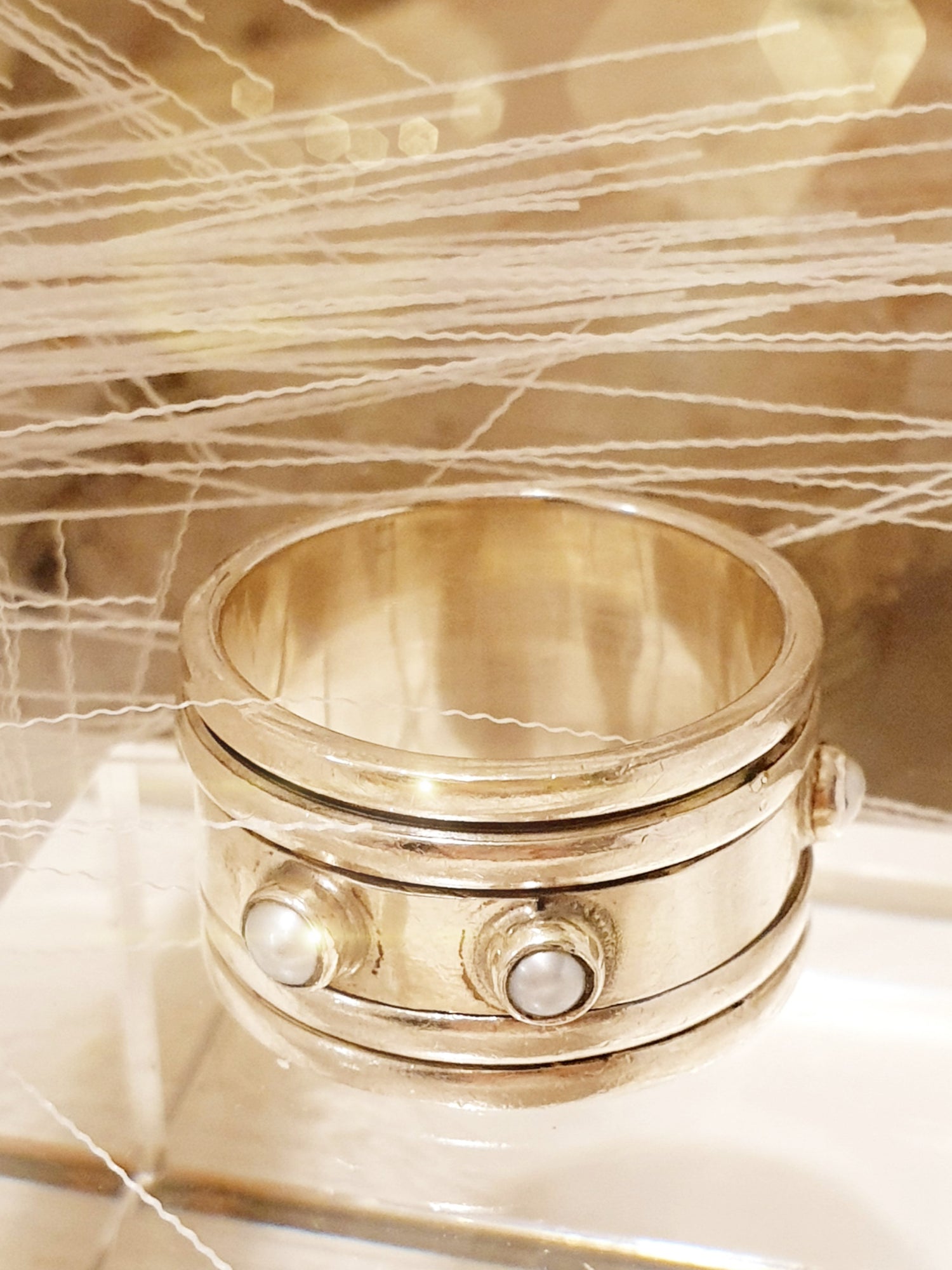 Beweglicher Sterlingsilber Ring mit kleinen Süßwasserperlen